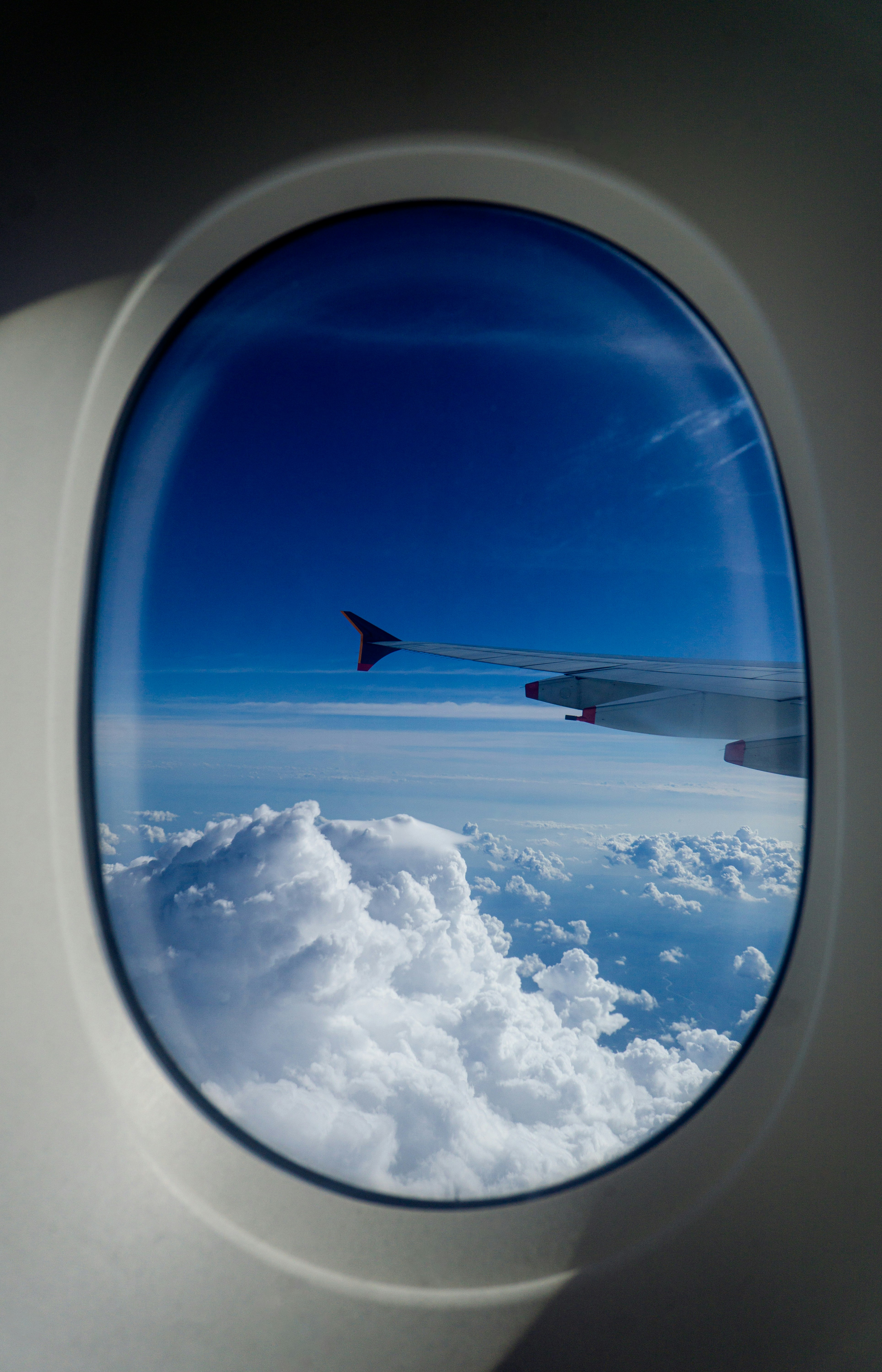 Airplane wing above the clouds